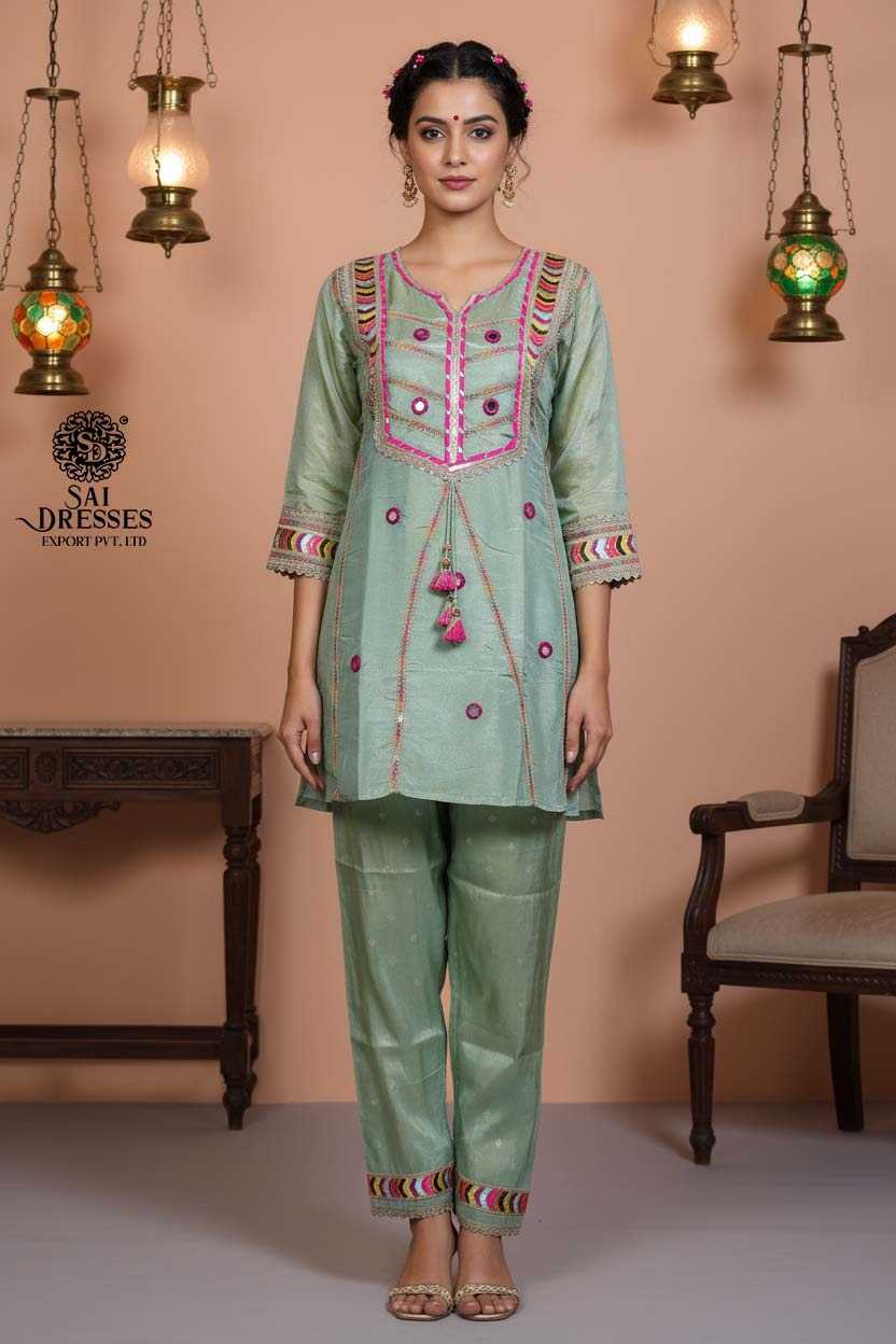 SAI DRESSES PRESENTS A FRESH GREEN CO-ORD STYLE SUIT WITH DETAILED EMBROIDERY AND CONTEMPORARY FLAIR.