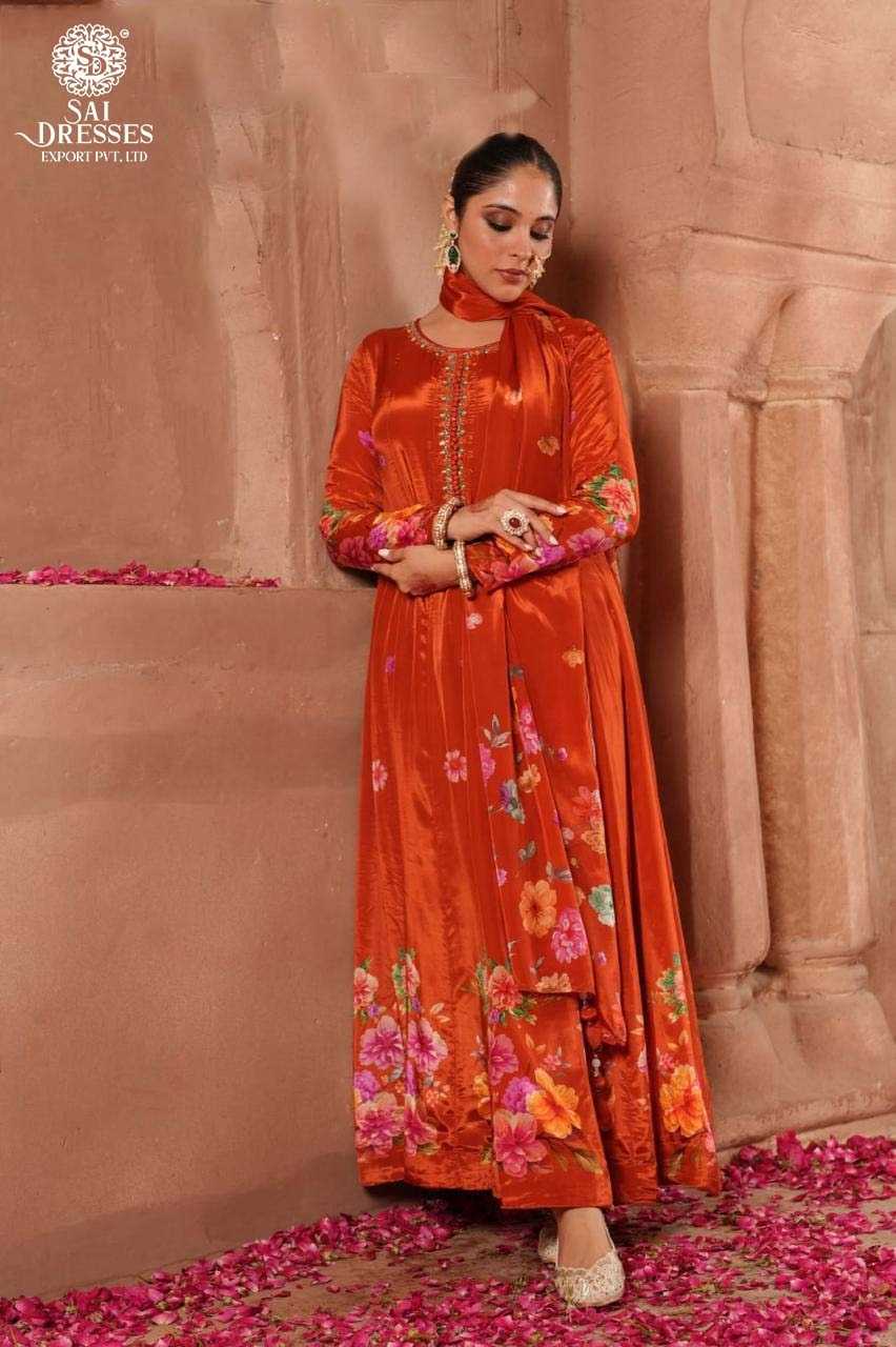 ELEGANT RUST ORANGE ANARKALI IN LUXURIOUS FABRIC WITH MULTI-FLORAL DESIGNS AND EMBROIDERED NECK DETAILING – PURE ETHNIC GRACE.