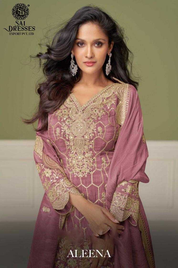 ELEGANT SILK GHARARA SUIT WITH INTRICATE GOLDEN EMBROIDERY, SCALLOPED BORDERS, AND MATCHING DUPATTA – A PERFECT BLEND OF TRADITION AND LUXURY.