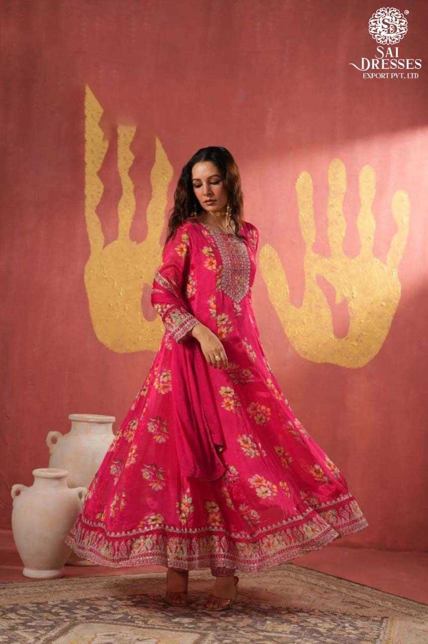 GRACEFUL MAGENTA ANARKALI SUIT WITH FLORAL PATTERN AND DETAILED HANDWORK – A BLEND OF STYLE AND ELEGANCE.
