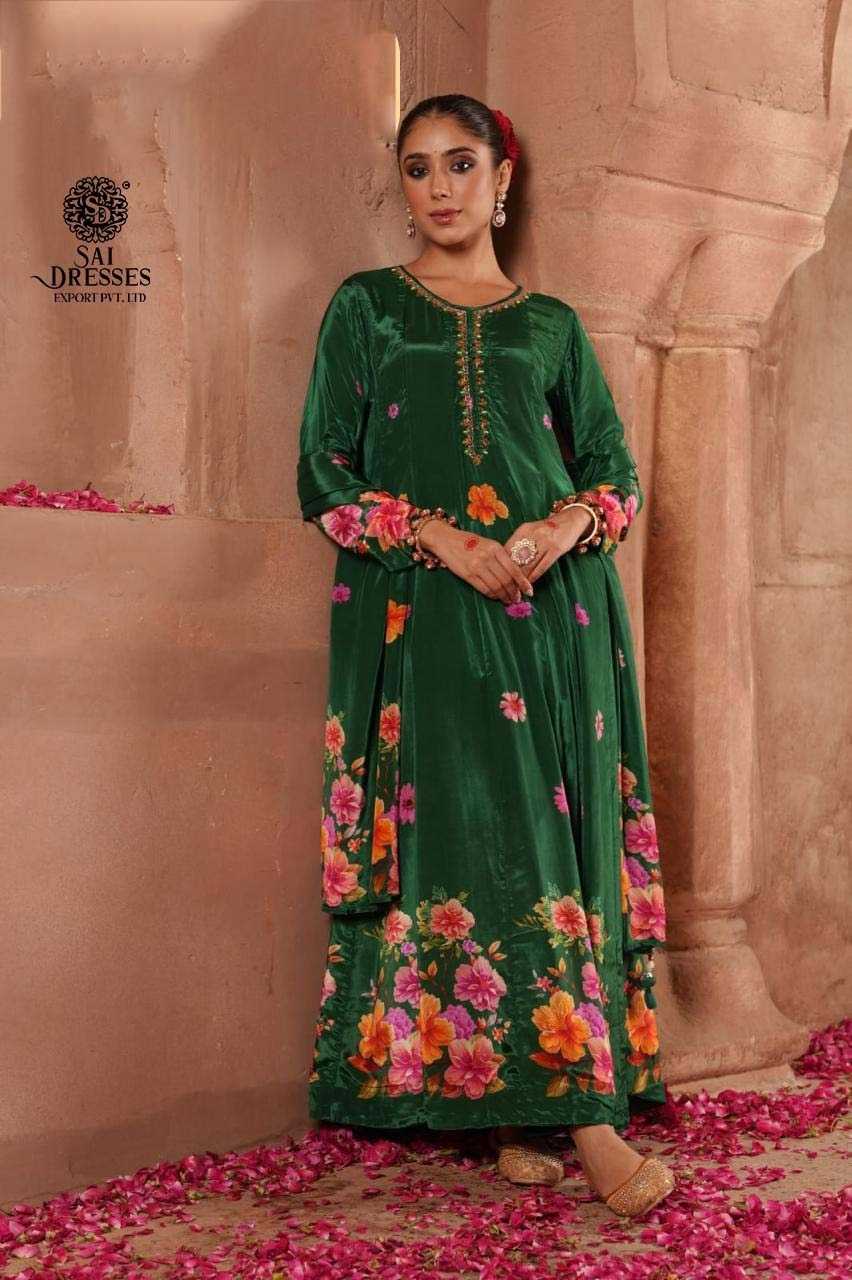 RICH BOTTLE GREEN VELVET ANARKALI SUIT WITH VIBRANT MULTI-FLORAL PRINT AND EMBELLISHED NECKLINE – A PERFECT FESTIVE MASTERPIECE.