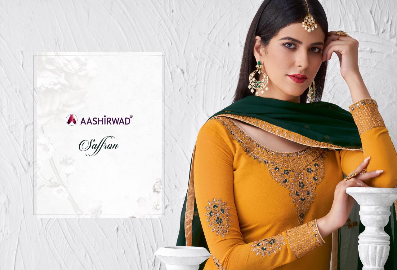 Aashirwad Creation Presents Saffaron Catalogue Of Heavy Dress Material At Wholesale Rate In Surat