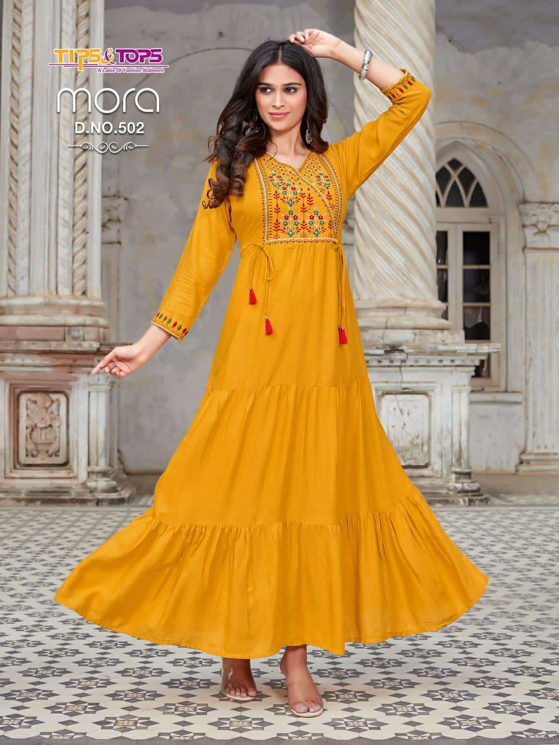 TIPS & TOPS PRESENT MORA VOL 5 FANCY GOWN STYLE LONG KURTIS IN WHOLESALE PRICE IN SURAT - SAI DRESSES