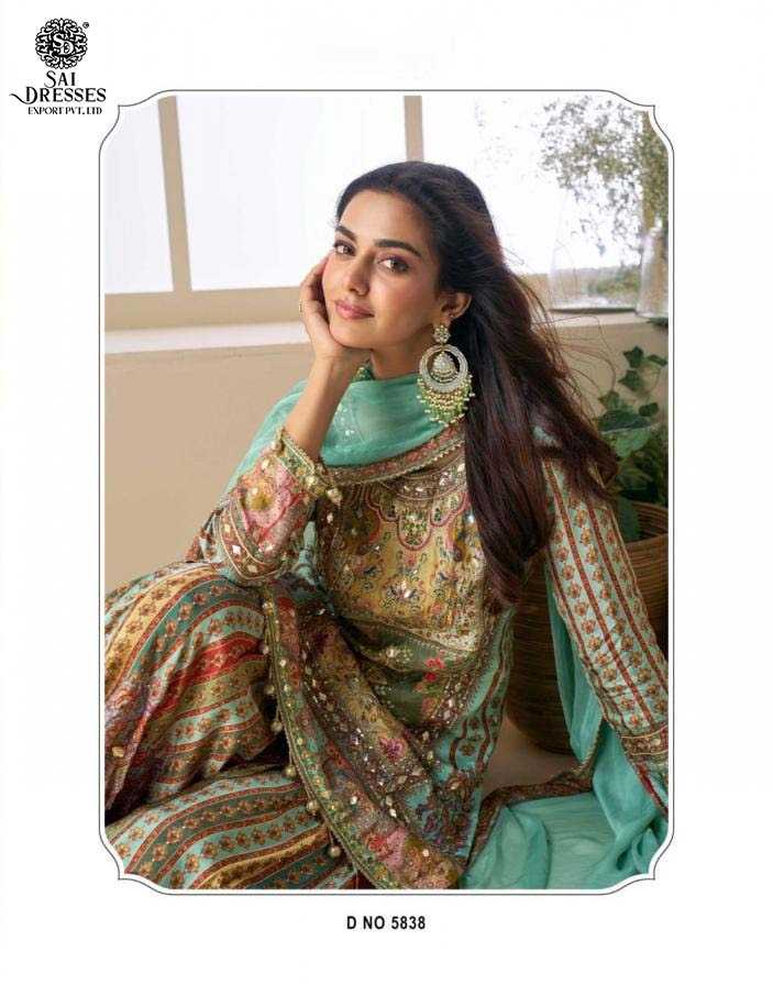 A REGAL COLLECTION OF DESIGNER SHARARA SUITS FEATURING INTRICATE EMBROIDERY AND RICH TRADITIONAL PRINTS.