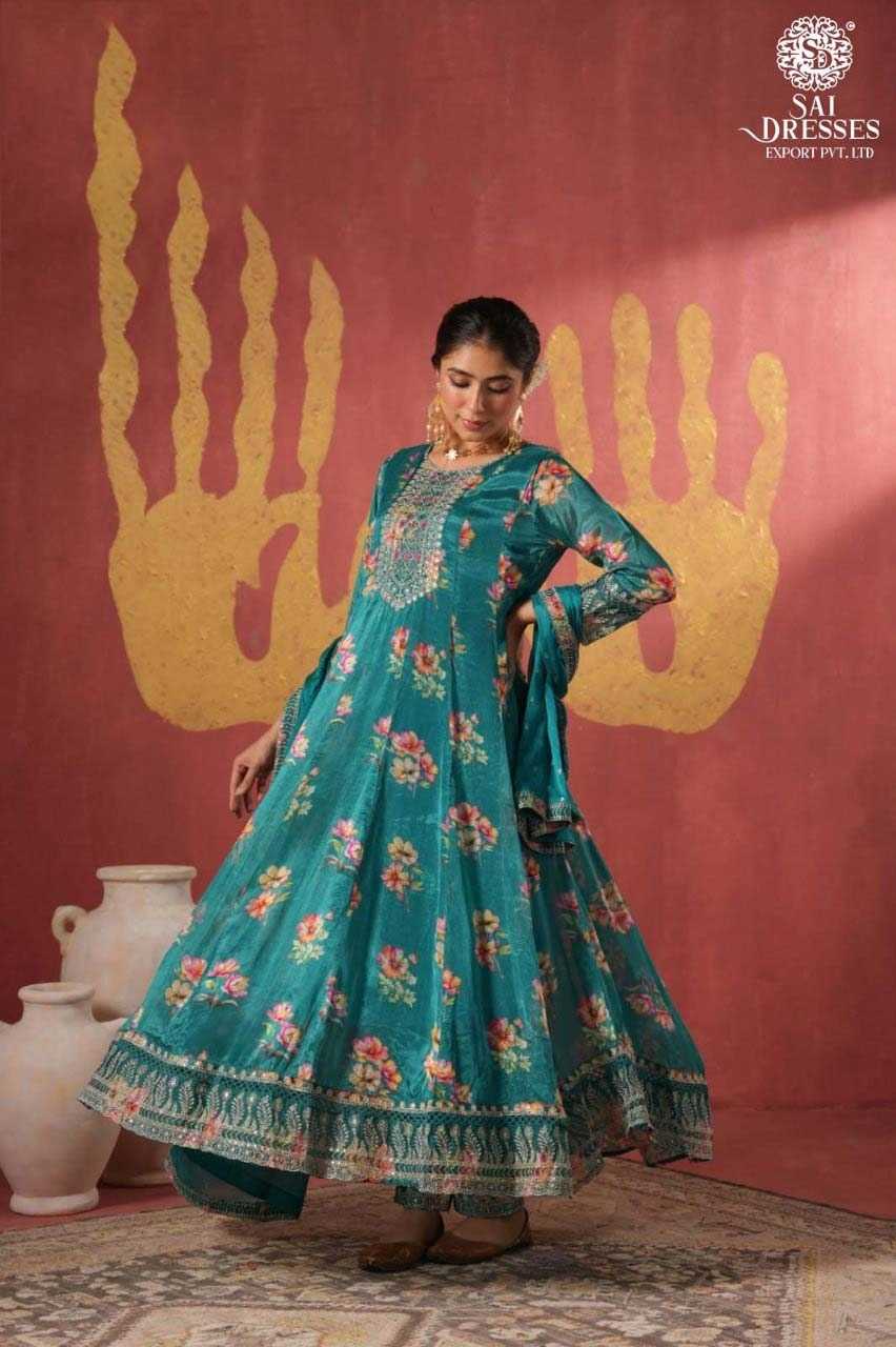 LUXURIOUS TEAL BLUE ANARKALI WITH FLORAL WEAVING AND DETAILED EMBROIDERY – A MUST-HAVE FESTIVE MASTERPIECE.