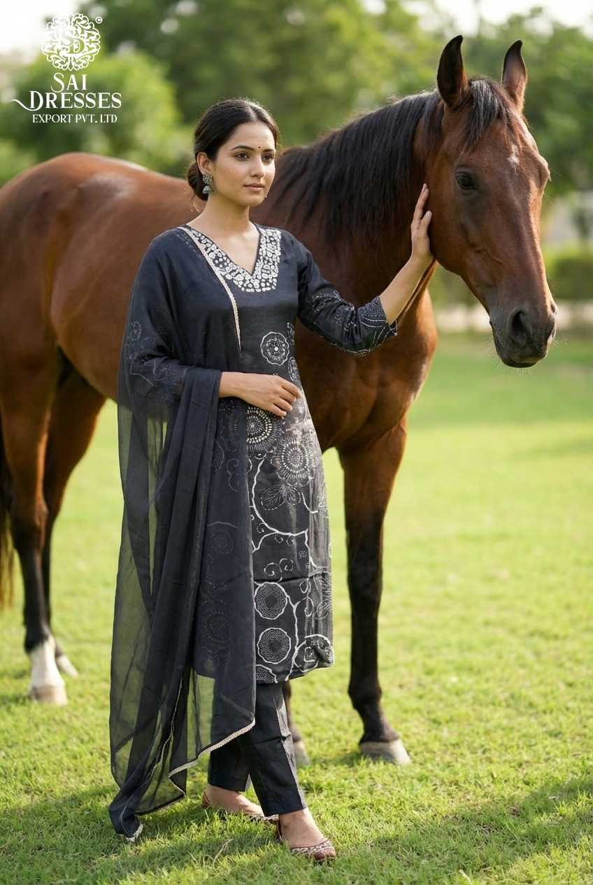 PURE MASLIN SUIT WITH INTRICATE HEAVY HAND EMBROIDERY, SOFT FLOWY FABRIC AND ELEGANT TRADITIONAL FINISH