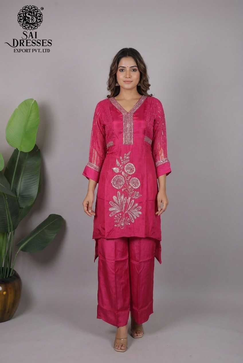 PURE NATURAL CREPE RASPBERRY PINK SUIT WITH INTRICATE HEAVY HAND EMBROIDERY, SOFT FLOWY TEXTURE AND ELEGANT FESTIVE LOOK