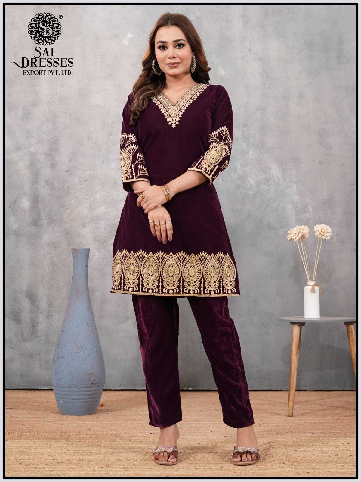 WINE DESIGNER INSPIRED VELVET SUIT SET WITH ELEGANT V-NECK HAND EMBROIDERY, BOLD SLEEVE MOTIFS AND STATEMENT HEAVY BORDER – EXCLUSIVE PARTY AND FESTIVE WEAR LADIES COLLECTION