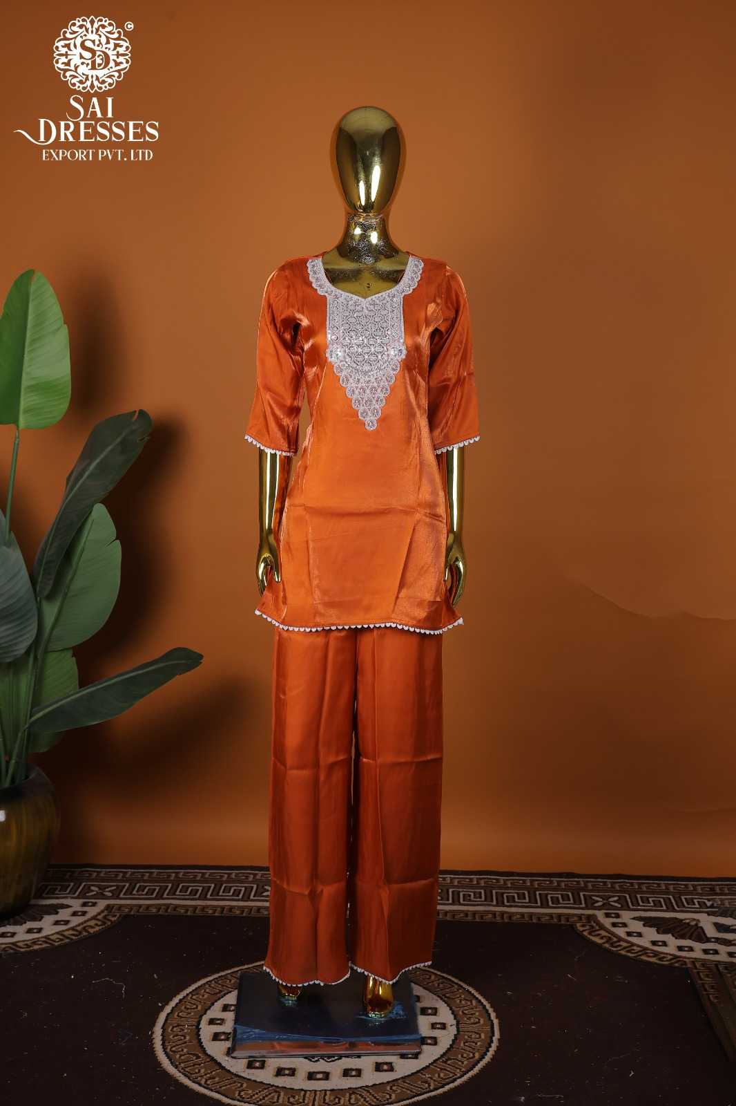 PREMIUM GLASS ROMAN ORANGE KURTA SET WITH HEAVY WHITE EMBROIDERED NECK PATTERN AND CLASSIC PALAZZO – PARTY & FESTIVE COLLECTION