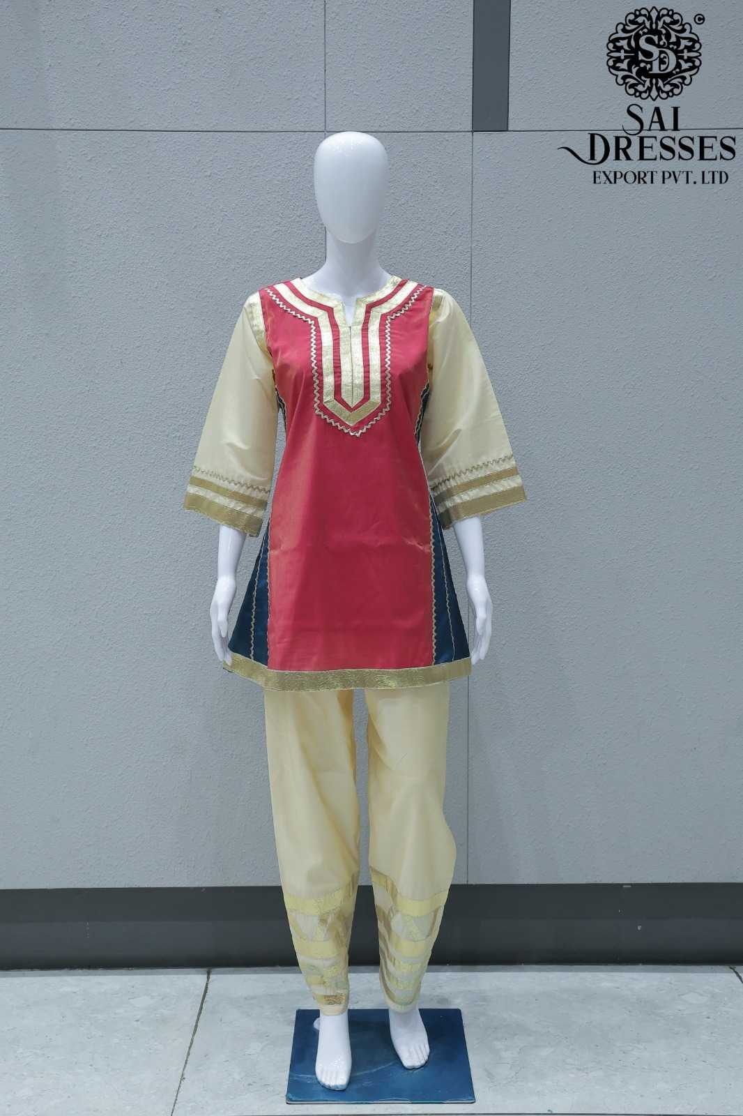ROSE PINK AND CREAM DESIGNER KURTI PANT SET WITH GOLDEN DETAILING