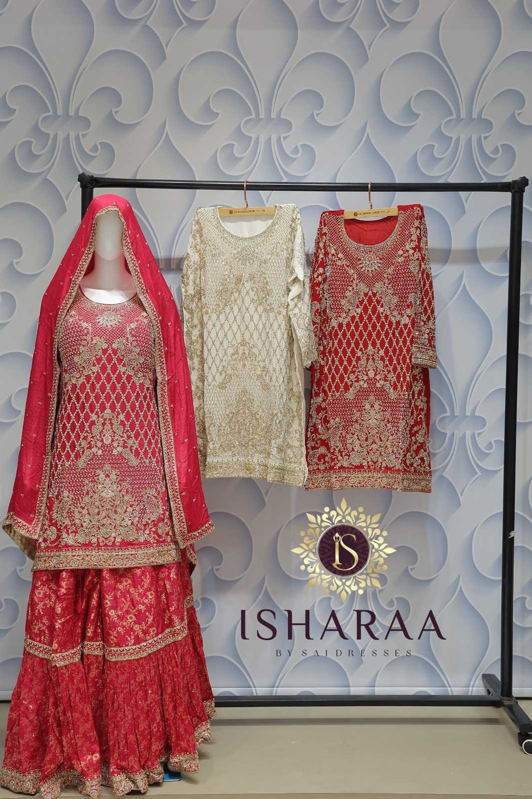 RANI PINK HEAVY EMBROIDERED SHARARA SET WITH INTRICATE FESTIVE WORK AND PREMIUM TRADITIONAL FINISH