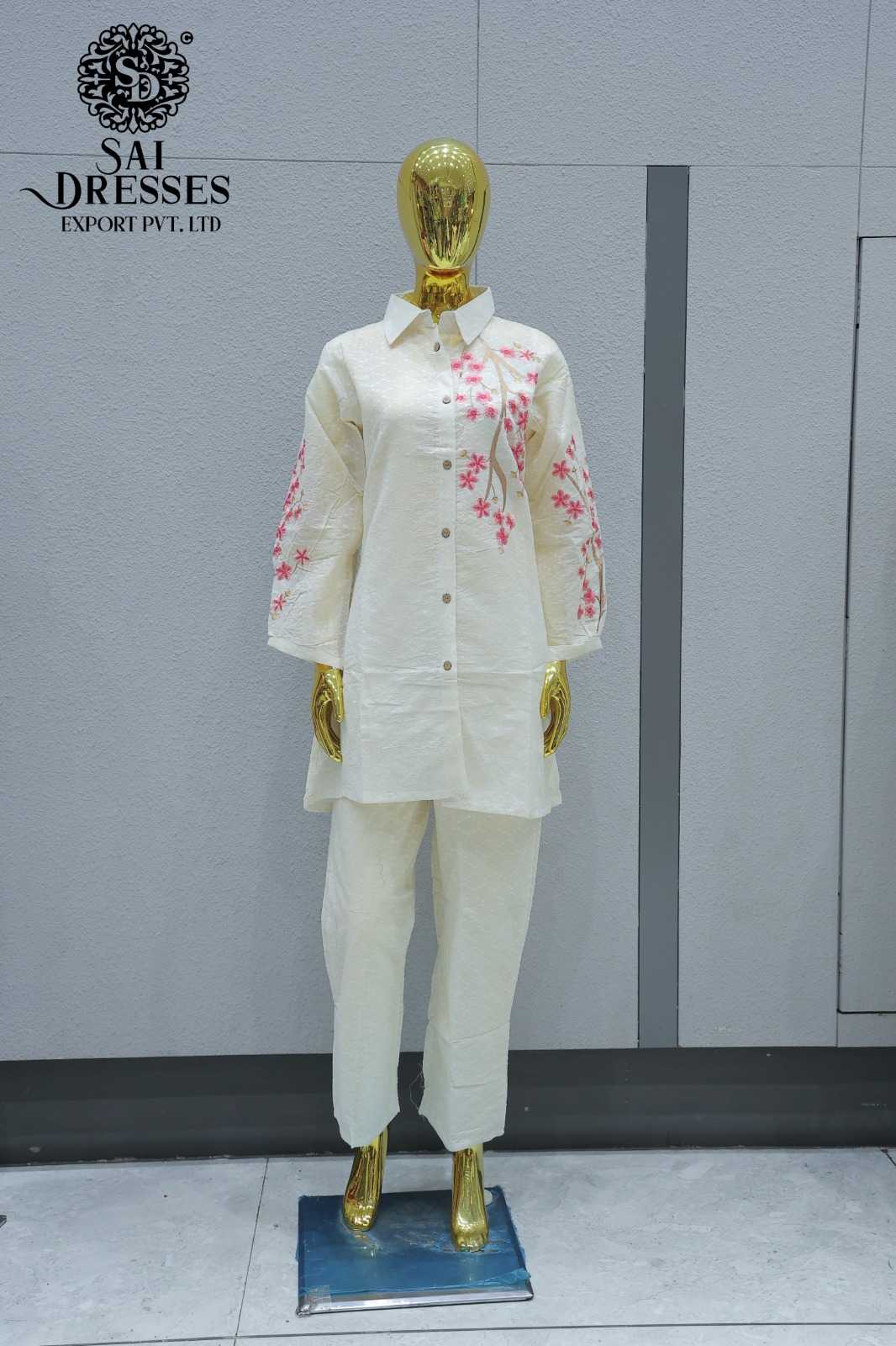 SLUB COTTON ELEGANT KURTI SET WITH SIDE FLORAL EMBROIDERY WORK IN OFF WHITE WITH SOFT PINK BLOSSOM DETAILING