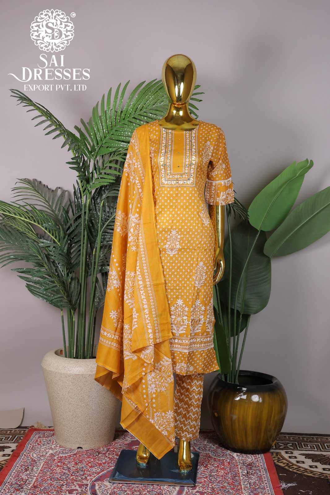 ORANGE PRINTED SUIT WITH MATCHING DUPATTA AND PANT SET